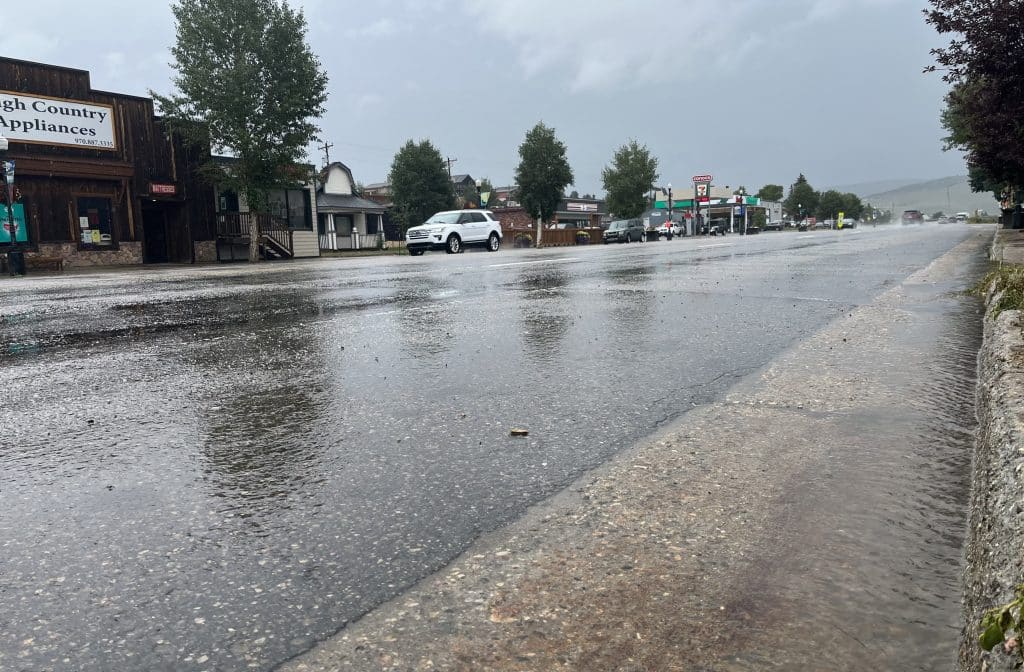 Rain causes flash flood watch and Highway 125 closure